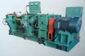 Towh-hroll mixing mill